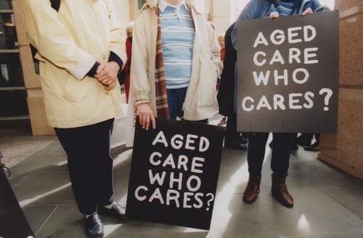 Protest signs at the 2001 aged care rally.
