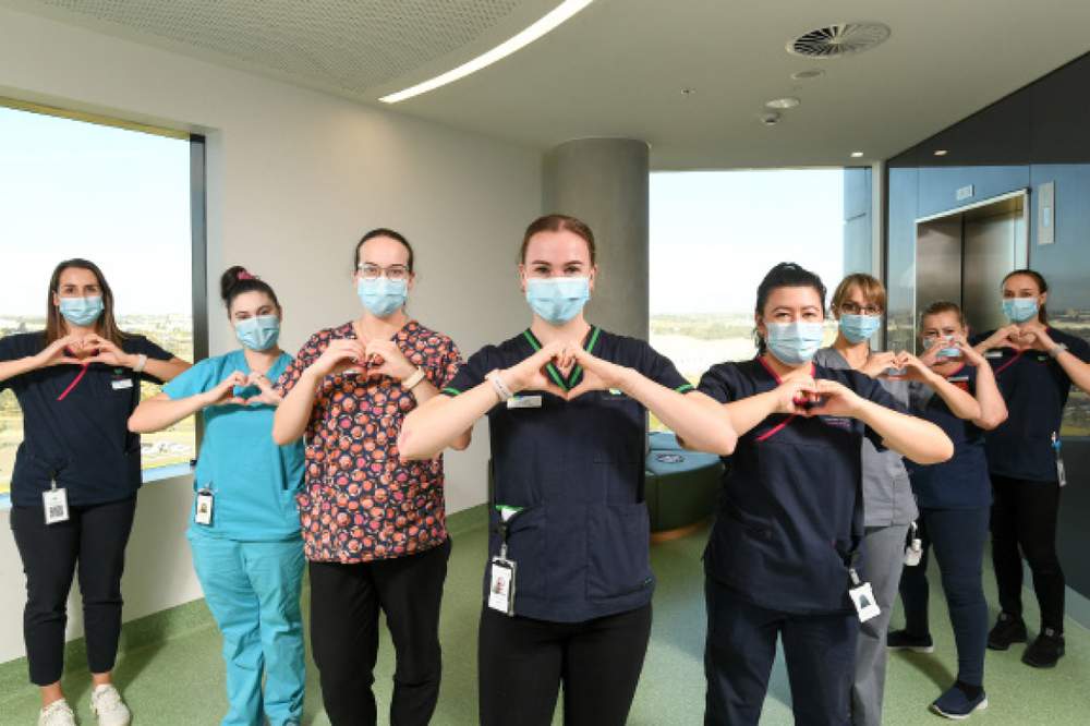 RUSOM Judith Robinson and some of the Joan Kirner Women’s and Children’s Hospital midwifery team. Photo: Penny Stephens, courtesy Western Health