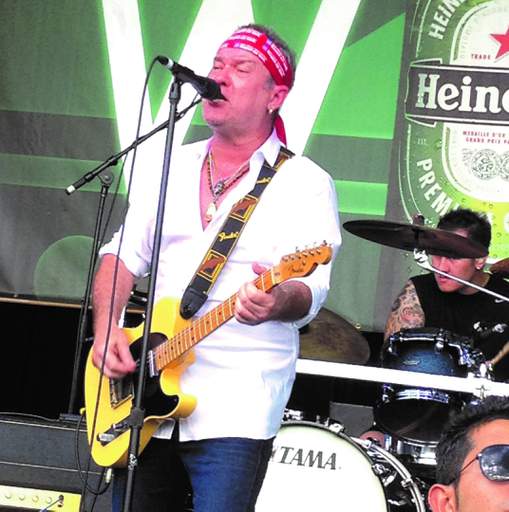 Singer Jimmy Barnes wore a campaign bandanna during a set.