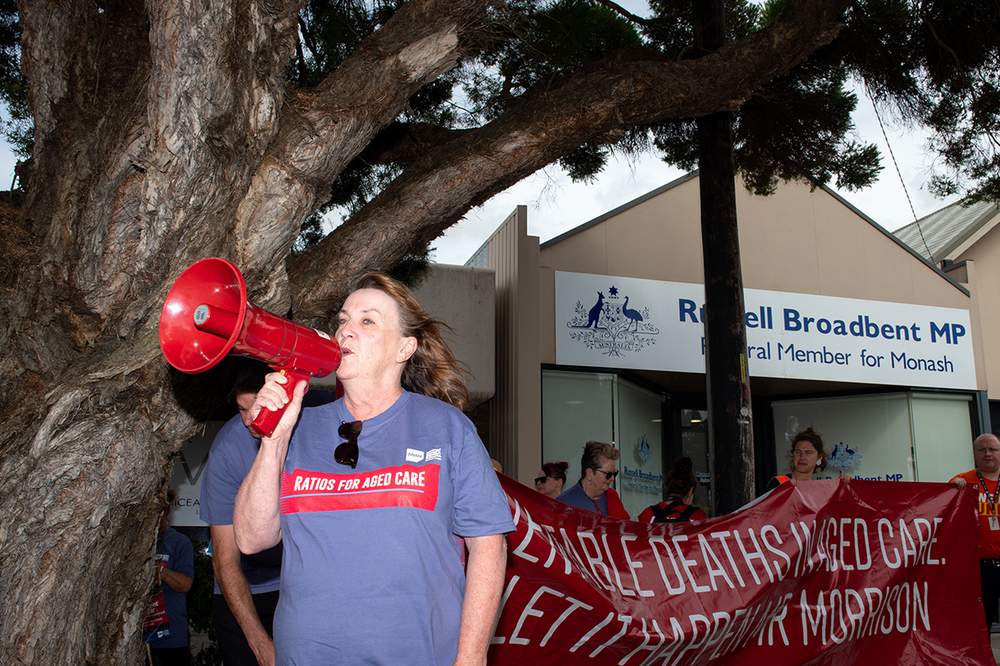 ANMF (Vic Branch) Secretary Lisa Fitzpatrick addresses the crowd outside Russell Broadbent’s office. Photo: Penny Stephens