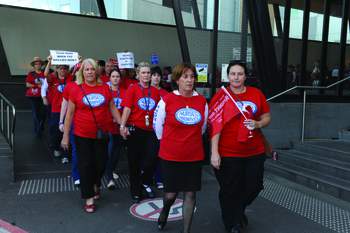 ANMF (Vic Branch) Secretary Lisa Fitzpatrick leads Royal Melbourne Hospital members out on their first walkout, February 2012
